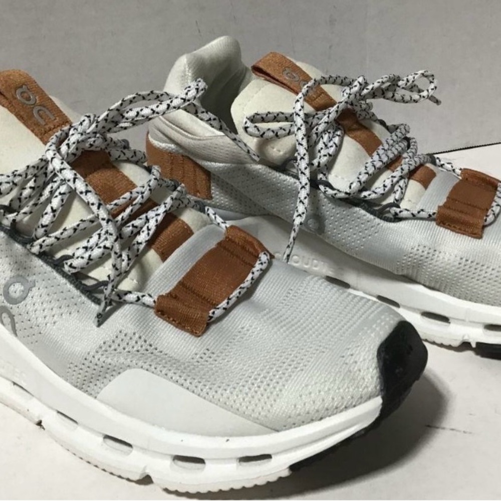 On Running Athletic Shoes White and Brown. Men’s size 7/Womens 9 $100